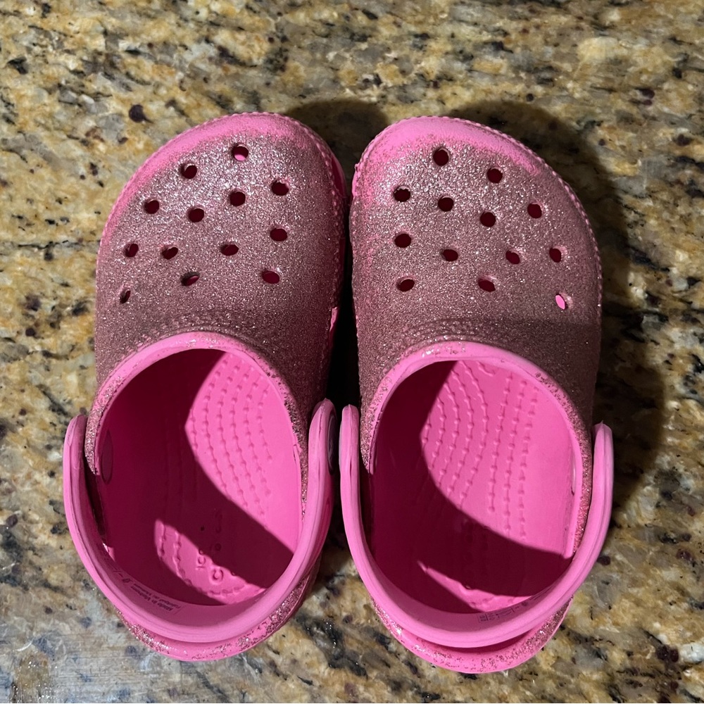 Sparkly pink toddler crocs size C6